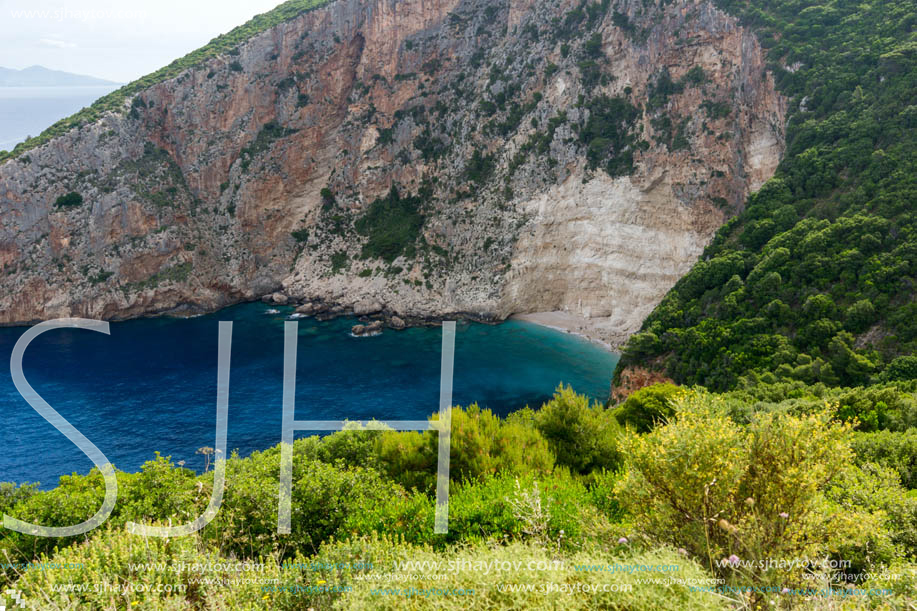 Blue water and rocks of beach at Zakynthos island, Greece