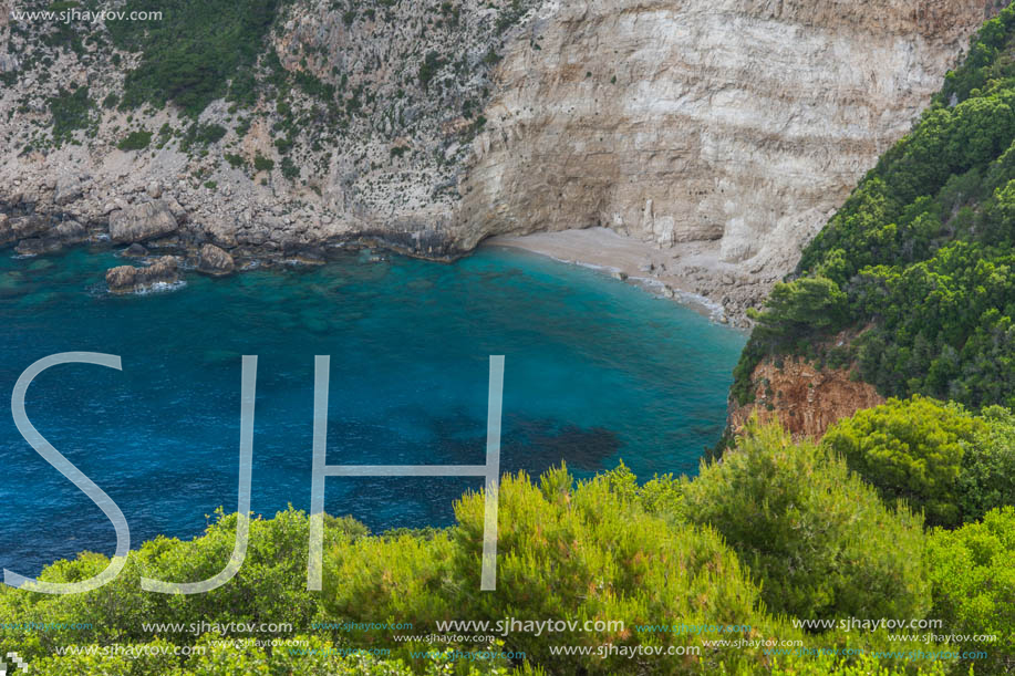 Blue water and rocks of beach at Zakynthos island, Greece