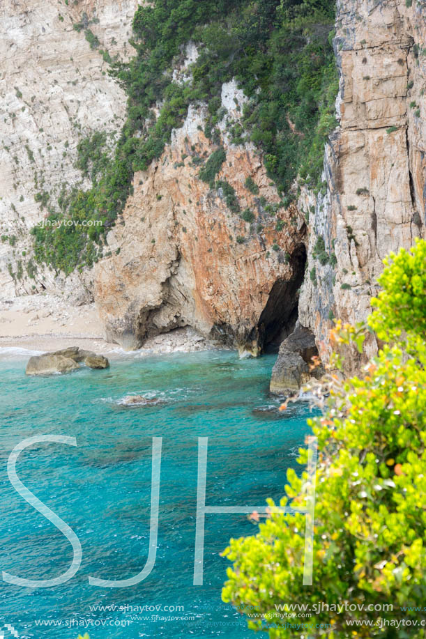 Blue water and rocks of beach at Zakynthos island, Greece