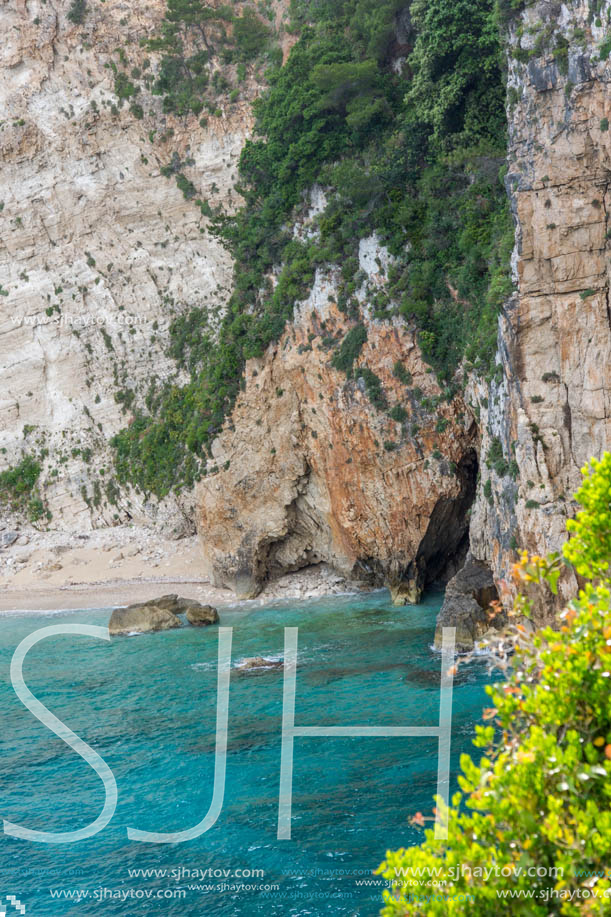 Blue water and rocks of beach at Zakynthos island, Greece