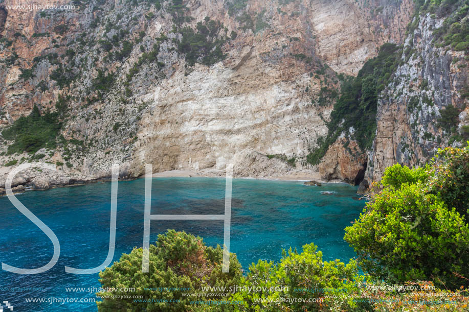 Blue water and rocks of beach at Zakynthos island, Greece