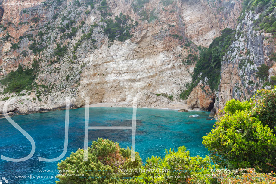 Blue water and rocks of beach at Zakynthos island, Greece