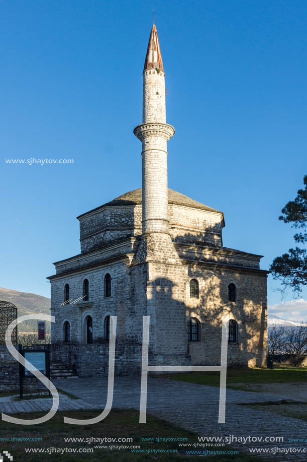 IOANNINA, GREECE - DECEMBER 27, 2014: Amazing Sunset view of Fethiye Mosque in castle of city of Ioannina, Epirus, Greece