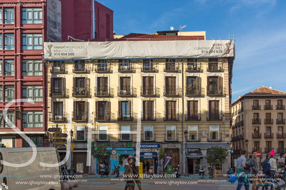 MADRID, SPAIN - JANUARY 23, 2018: Facade of typical Buildings and streets in City of Madrid, Spain