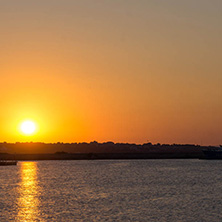 SOZOPOL, BULGARIA - JULY 11, 2016: Sunset at the port of Sozopol, Burgas Region, Bulgaria