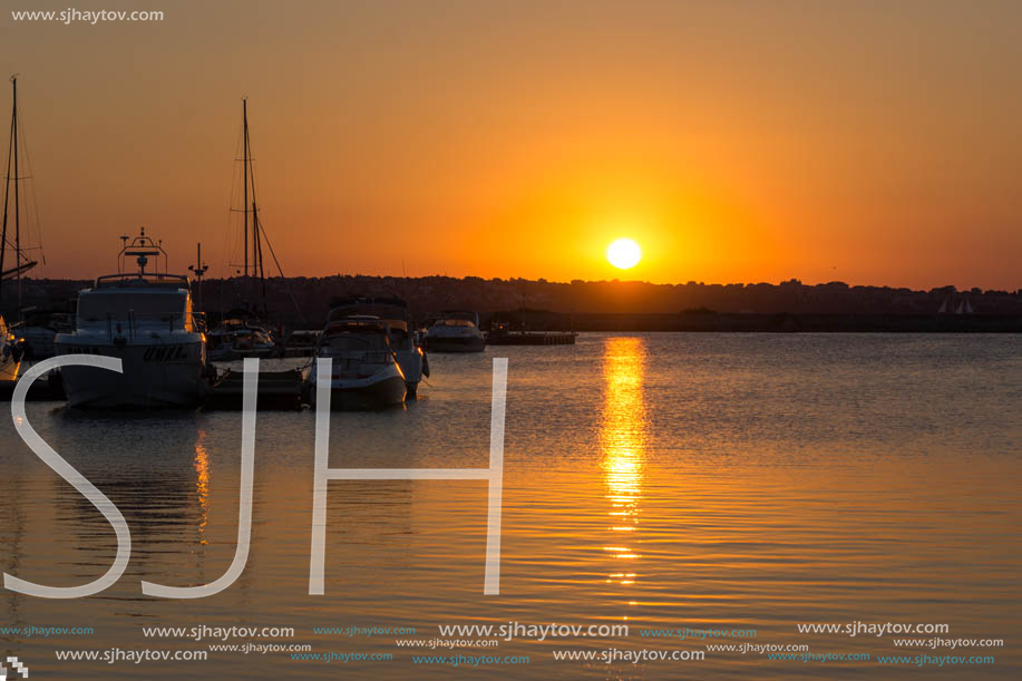 SOZOPOL, BULGARIA - JULY 11, 2016: Sunset at the port of Sozopol, Burgas Region, Bulgaria