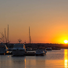 SOZOPOL, BULGARIA - JULY 11, 2016: Sunset at the port of Sozopol, Burgas Region, Bulgaria