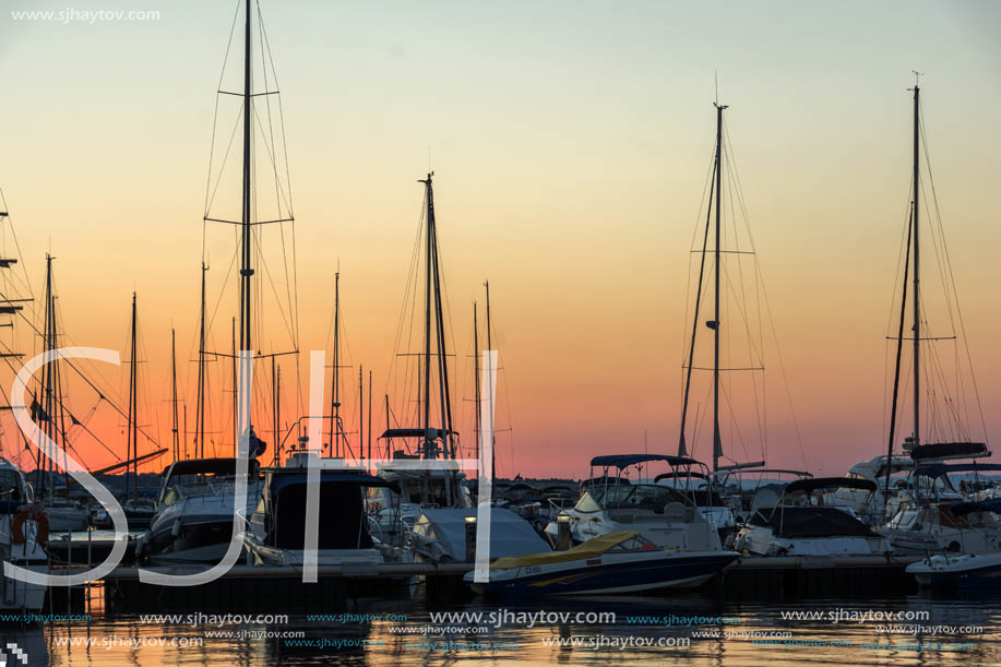 SOZOPOL, BULGARIA - JULY 11, 2016: Sunset at the port of Sozopol, Burgas Region, Bulgaria