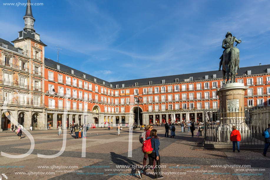 MADRID, SPAIN - JANUARY 23, 2018:  Tourist visiting Plaza Mayor in city of Madrid, Spain