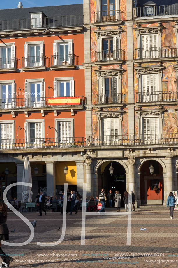 MADRID, SPAIN - JANUARY 23, 2018:  Tourist visiting Plaza Mayor in city of Madrid, Spain