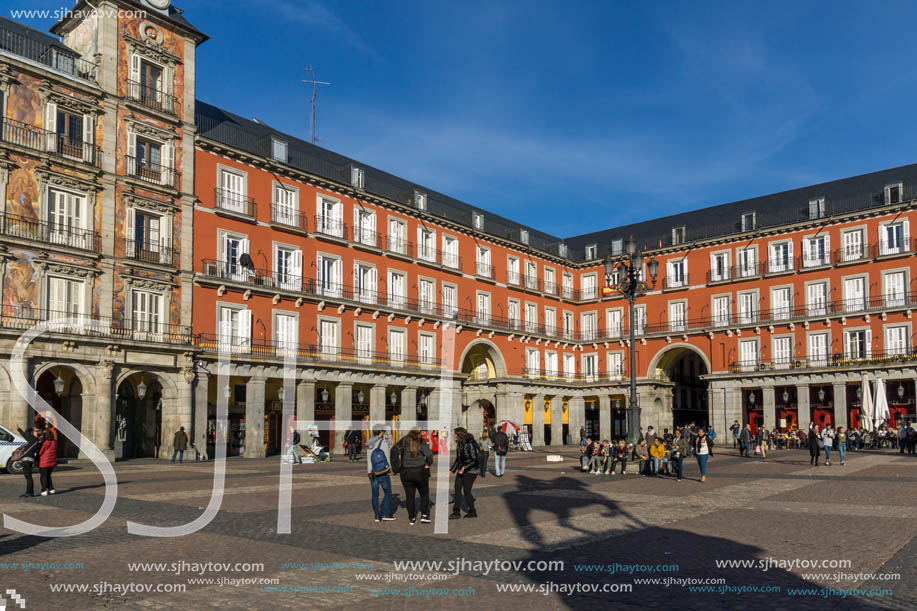 MADRID, SPAIN - JANUARY 23, 2018:  Tourist visiting Plaza Mayor in city of Madrid, Spain