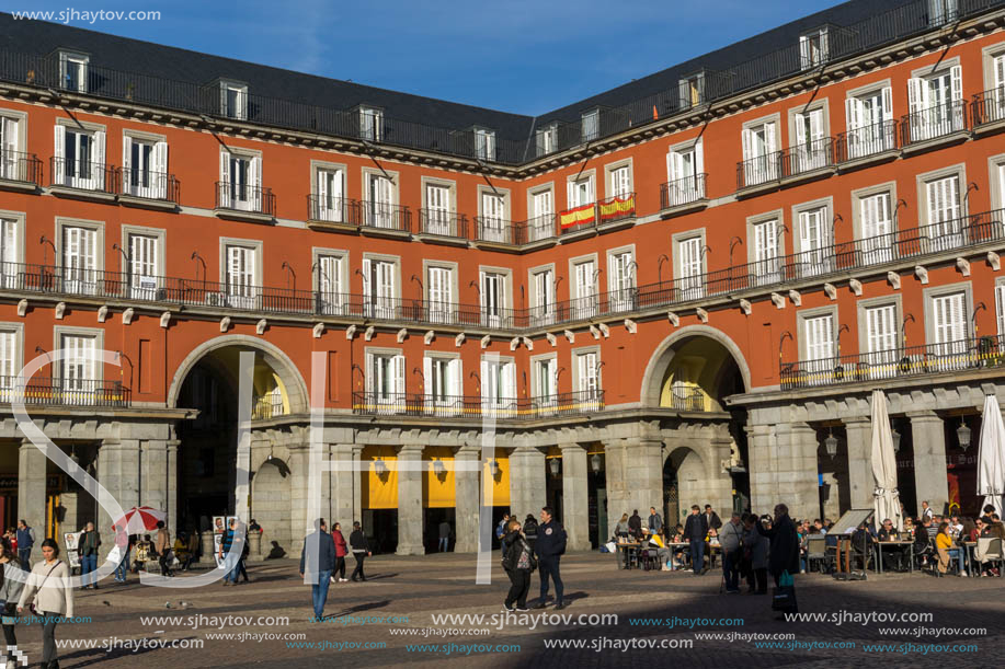 MADRID, SPAIN - JANUARY 23, 2018:  Tourist visiting Plaza Mayor in city of Madrid, Spain