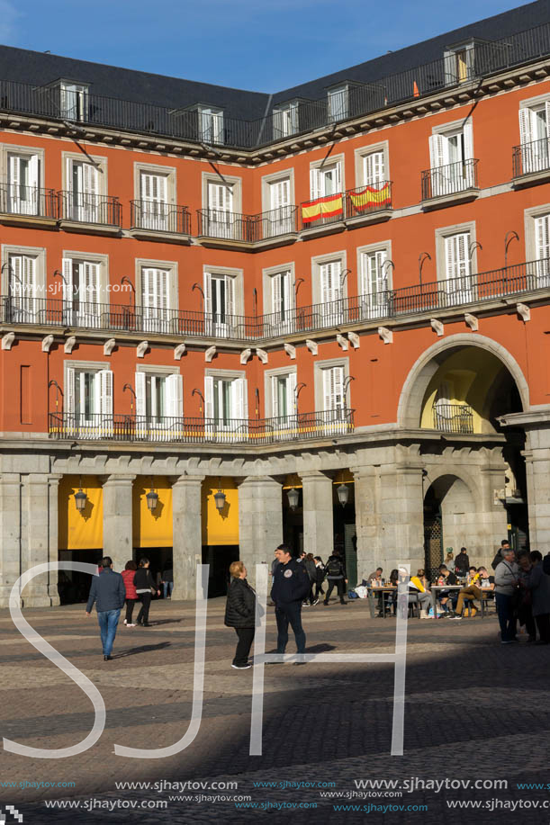 MADRID, SPAIN - JANUARY 23, 2018:  Tourist visiting Plaza Mayor in city of Madrid, Spain