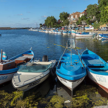 SOZOPOL, BULGARIA - JULY 12, 2016: Small Fishing boats at the port of town of Sozopol, Burgas Region, Bulgaria