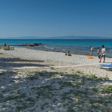 NEA FOKEA, KASSANDRA, CHALKIDIKI, GREECE - JUNE 24, 2014: Beach of Nea Fokea at Kassandra peninsula, Chalkidiki, Central Macedonia, Greece