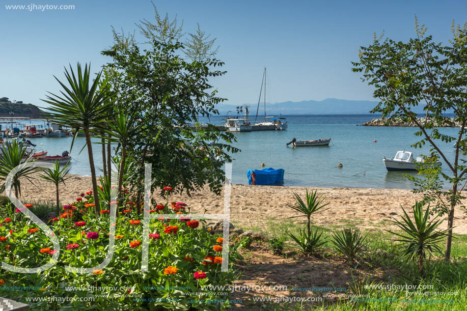 NEA FOKEA, KASSANDRA, CHALKIDIKI, GREECE - JUNE 24, 2014: Beach of Nea Fokea at Kassandra peninsula, Chalkidiki, Central Macedonia, Greece