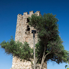 NEA FOKEA, KASSANDRA, CHALKIDIKI, GREECE - JUNE 24, 2014: Byzantine Tower in of Nea Fokea at Kassandra peninsula, Chalkidiki, Central Macedonia, Greece