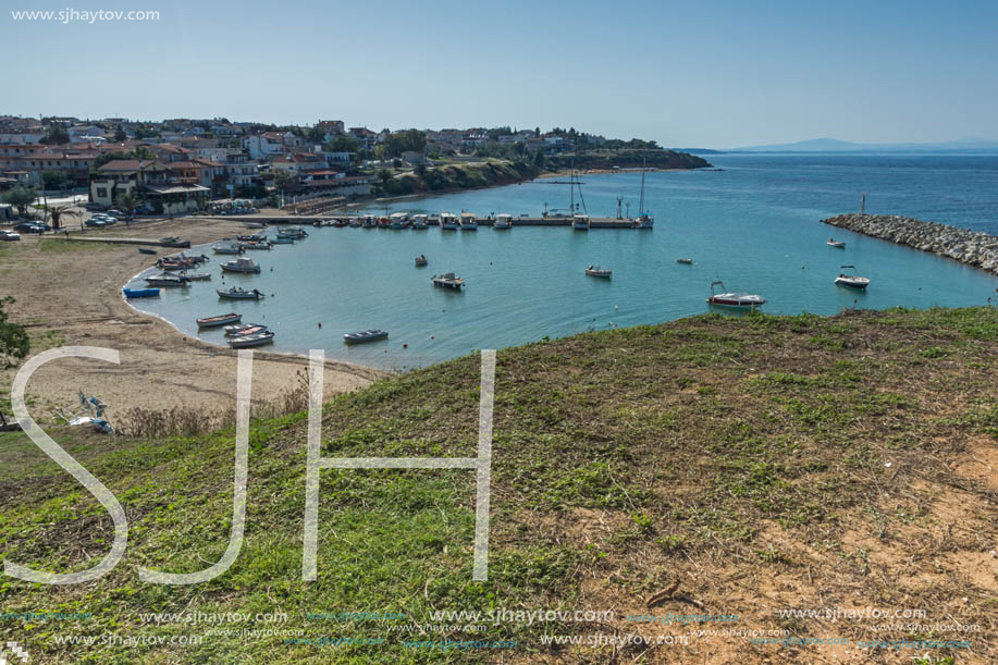 NEA FOKEA, KASSANDRA, CHALKIDIKI, GREECE - JUNE 24, 2014: Port of Nea Fokea at Kassandra peninsula, Chalkidiki, Central Macedonia, Greece