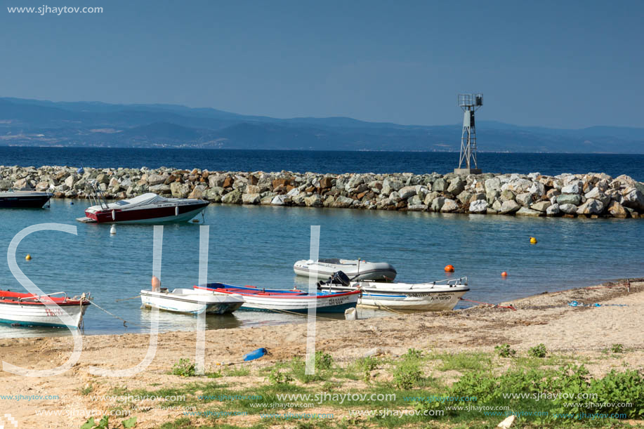 NEA FOKEA, KASSANDRA, CHALKIDIKI, GREECE - JUNE 24, 2014: Port of Nea Fokea at Kassandra peninsula, Chalkidiki, Central Macedonia, Greece