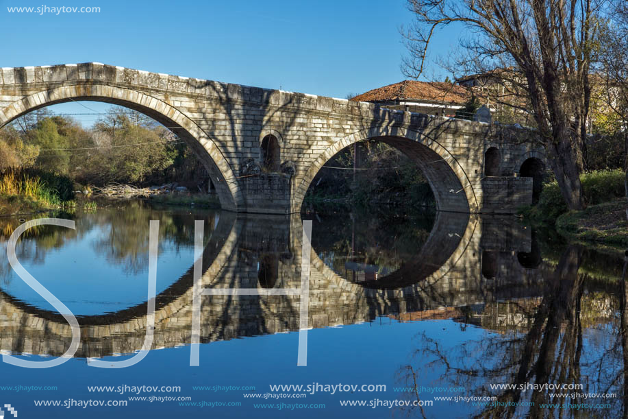 Autumn view of Kadin most - a 15th-century stone arch bridge over the Struma River at Nevestino, Kyustendil Province, Bulgaria