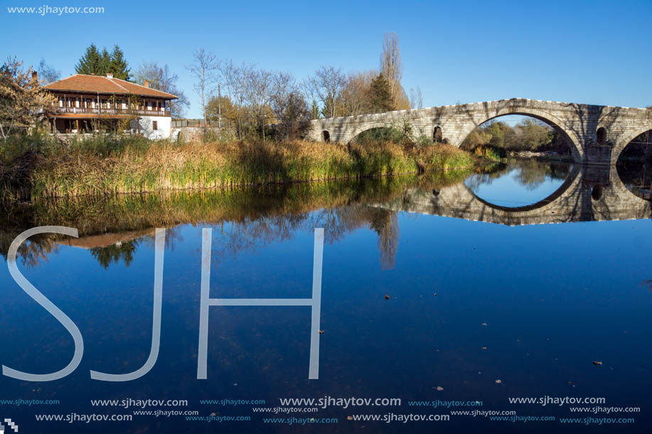 Autumn view of Kadin most - a 15th-century stone arch bridge over the Struma River at Nevestino, Kyustendil Province, Bulgaria