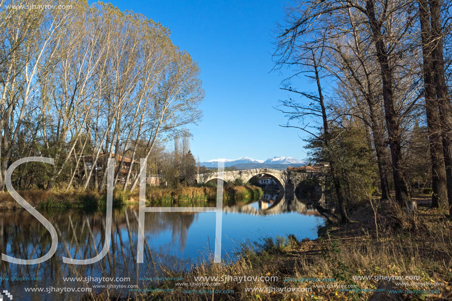 Autumn view of Kadin most - a 15th-century stone arch bridge over the Struma River at Nevestino, Kyustendil Province, Bulgaria