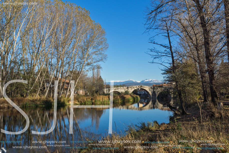 Autumn view of Kadin most - a 15th-century stone arch bridge over the Struma River at Nevestino, Kyustendil Province, Bulgaria