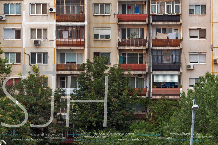 PLOVDIV, BULGARIA - AUGUST 3, 2018: Sunset view of Typical residential building from the communist period in city of Plovdiv, Bulgaria