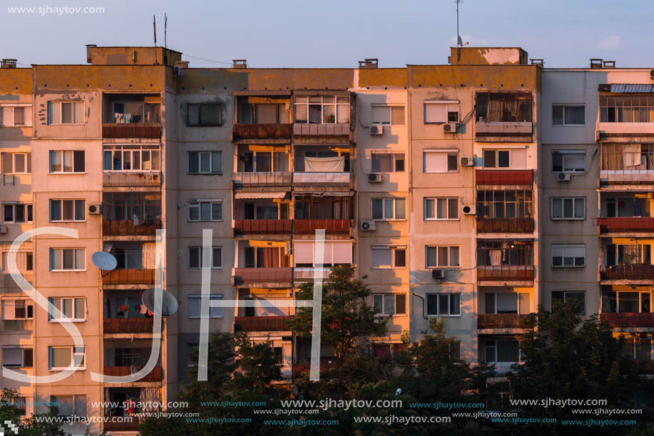 PLOVDIV, BULGARIA - AUGUST 3, 2018: Sunset view of Typical residential building from the communist period in city of Plovdiv, Bulgaria