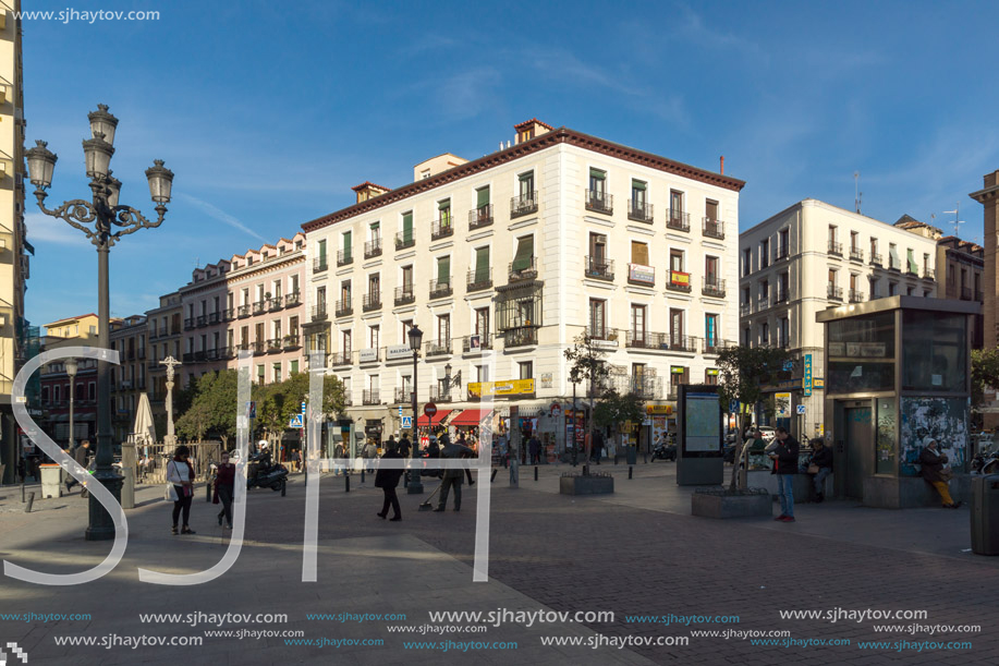 MADRID, SPAIN - JANUARY 23, 2018: Tourist visiting  Plaza de Jacinto Benavente in City of Madrid, Spain