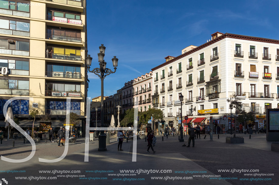 MADRID, SPAIN - JANUARY 23, 2018: Tourist visiting  Plaza de Jacinto Benavente in City of Madrid, Spain