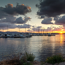 SOZOPOL, BULGARIA - JULY 12, 2016: Sunset at the port of Sozopol, Burgas Region, Bulgaria