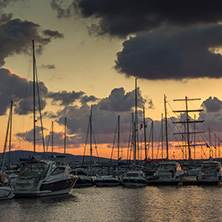 SOZOPOL, BULGARIA - JULY 12, 2016: Sunset at the port of Sozopol, Burgas Region, Bulgaria