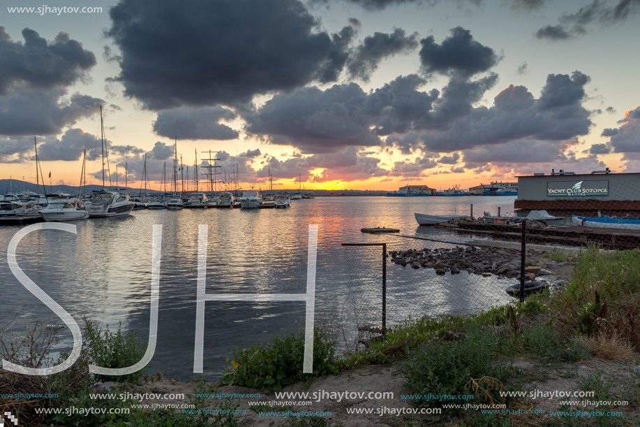 SOZOPOL, BULGARIA - JULY 12, 2016: Sunset at the port of Sozopol, Burgas Region, Bulgaria