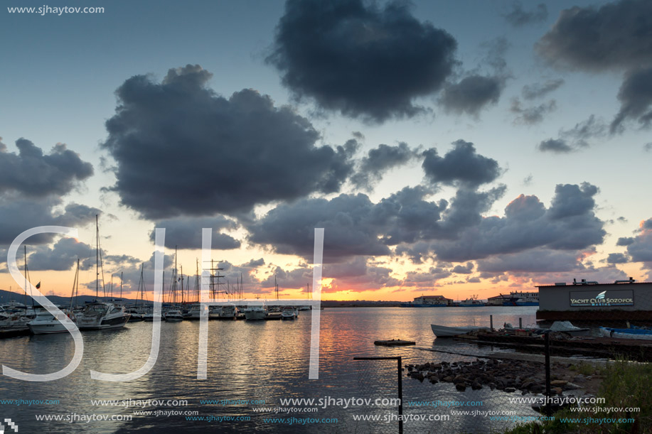 SOZOPOL, BULGARIA - JULY 12, 2016: Sunset at the port of Sozopol, Burgas Region, Bulgaria