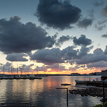 SOZOPOL, BULGARIA - JULY 12, 2016: Sunset at the port of Sozopol, Burgas Region, Bulgaria