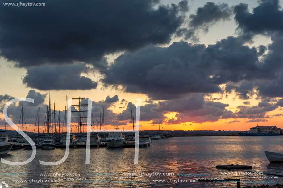 SOZOPOL, BULGARIA - JULY 12, 2016: Sunset at the port of Sozopol, Burgas Region, Bulgaria