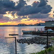 SOZOPOL, BULGARIA - JULY 12, 2016: Sunset at the port of Sozopol, Burgas Region, Bulgaria