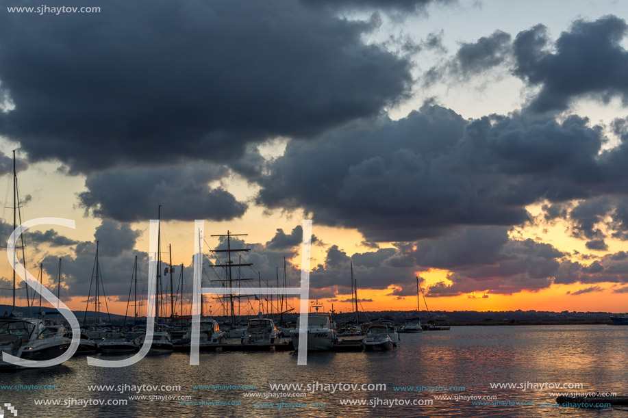 SOZOPOL, BULGARIA - JULY 12, 2016: Sunset at the port of Sozopol, Burgas Region, Bulgaria