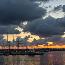 SOZOPOL, BULGARIA - JULY 12, 2016: Sunset at the port of Sozopol, Burgas Region, Bulgaria