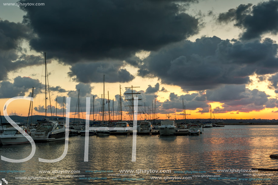 SOZOPOL, BULGARIA - JULY 12, 2016: Sunset at the port of Sozopol, Burgas Region, Bulgaria