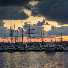 SOZOPOL, BULGARIA - JULY 12, 2016: Sunset at the port of Sozopol, Burgas Region, Bulgaria