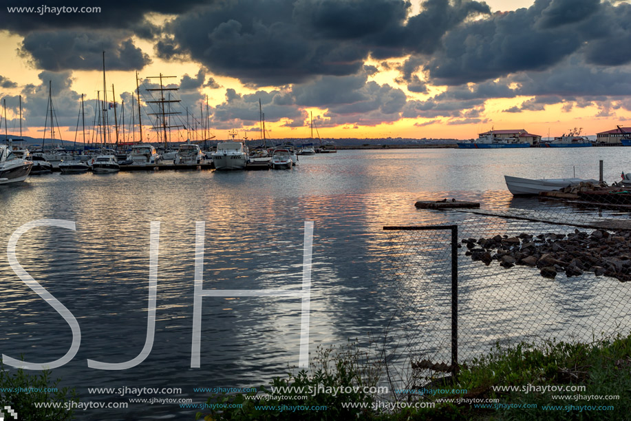 SOZOPOL, BULGARIA - JULY 12, 2016: Sunset at the port of Sozopol, Burgas Region, Bulgaria