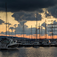 SOZOPOL, BULGARIA - JULY 12, 2016: Sunset at the port of Sozopol, Burgas Region, Bulgaria