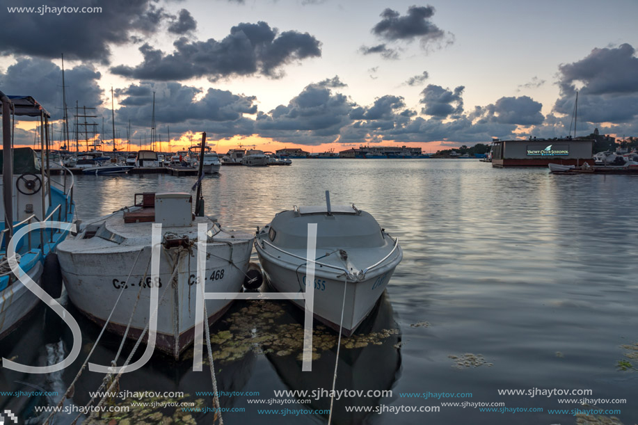 SOZOPOL, BULGARIA - JULY 12, 2016: Sunset at the port of Sozopol, Burgas Region, Bulgaria