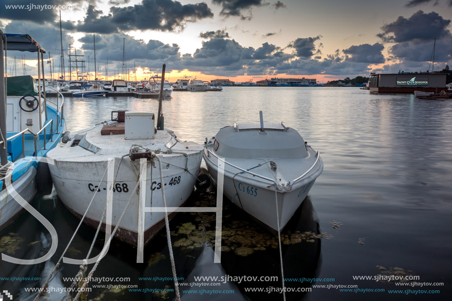 SOZOPOL, BULGARIA - JULY 12, 2016: Sunset at the port of Sozopol, Burgas Region, Bulgaria