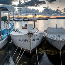 SOZOPOL, BULGARIA - JULY 12, 2016: Sunset at the port of Sozopol, Burgas Region, Bulgaria