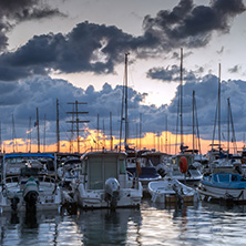 SOZOPOL, BULGARIA - JULY 12, 2016: Sunset at the port of Sozopol, Burgas Region, Bulgaria