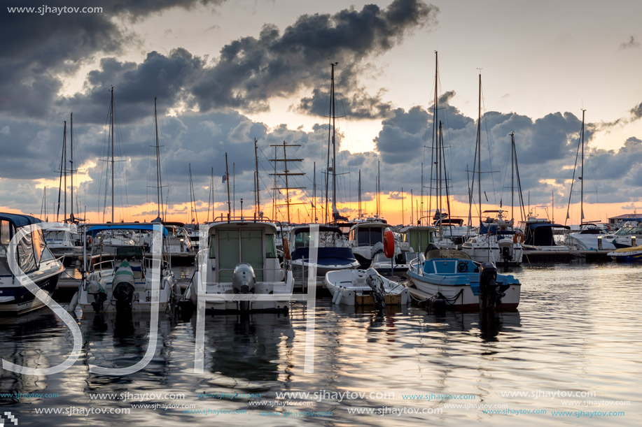 SOZOPOL, BULGARIA - JULY 12, 2016: Sunset at the port of Sozopol, Burgas Region, Bulgaria