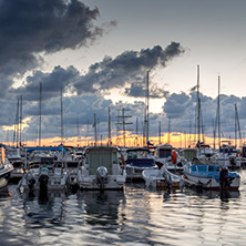 SOZOPOL, BULGARIA - JULY 12, 2016: Sunset at the port of Sozopol, Burgas Region, Bulgaria